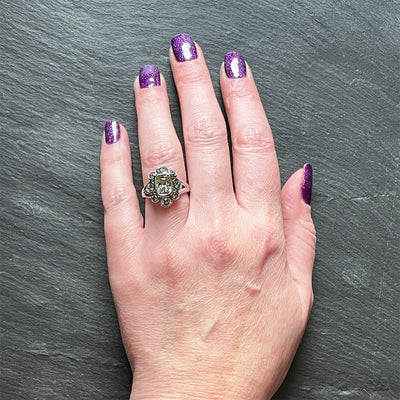 'Moon River' Platinum ring, 2.10CT cushion yellow sapphire bezel with 1.26TCW grey round brilliant diamond halo. Ring size 6.5