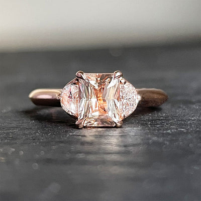 'Peachy Keen' 14K rose gold knife edge shank, 1.19ct peach sapphire and 0.25TCW Half moon diamond ring. Size 6.5