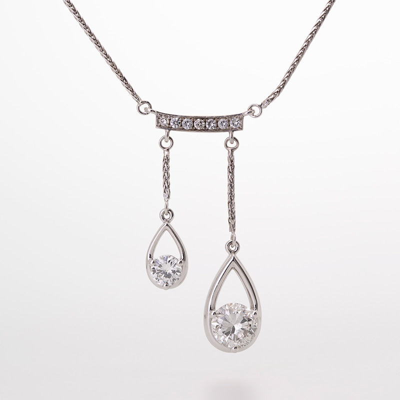 Heirloom diamond custom designed double drop from diamond bar pendant, set in white gold.