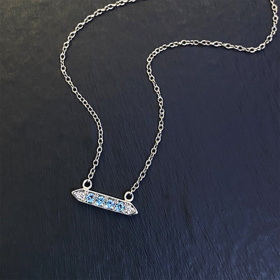 Aquamarine and Diamond Accented Bar Pendant in 10K White Gold