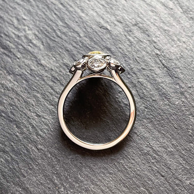 'Moon River' Platinum ring, 2.10CT cushion yellow sapphire bezel with 1.26TCW grey round brilliant diamond halo. Ring size 6.5