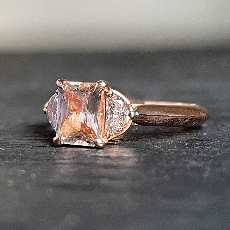 'Peachy Keen' 14K rose gold knife edge shank, 1.19ct peach sapphire and 0.25TCW Half moon diamond ring. Size 6.5