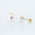 White 10mm Button Freshwater Pearl Earrings in 14K Yellow Gold